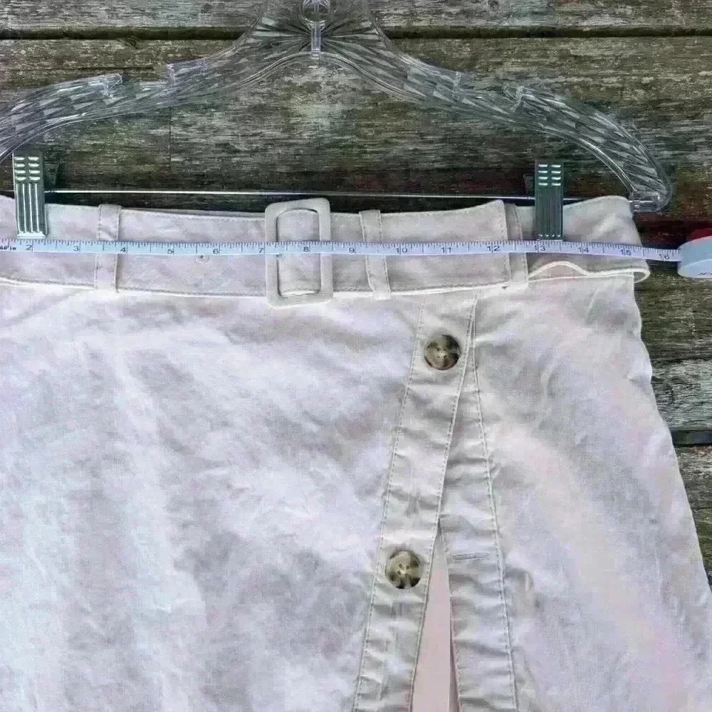 Super cute anthropology light pink linen skirt with faux thigh slit size 8